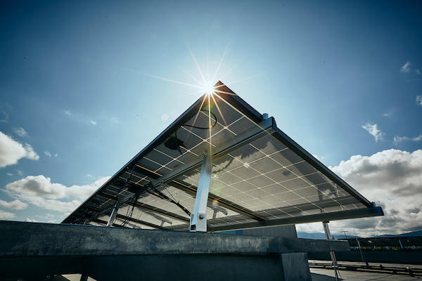 Image of a solar panel gleaming in the sun.